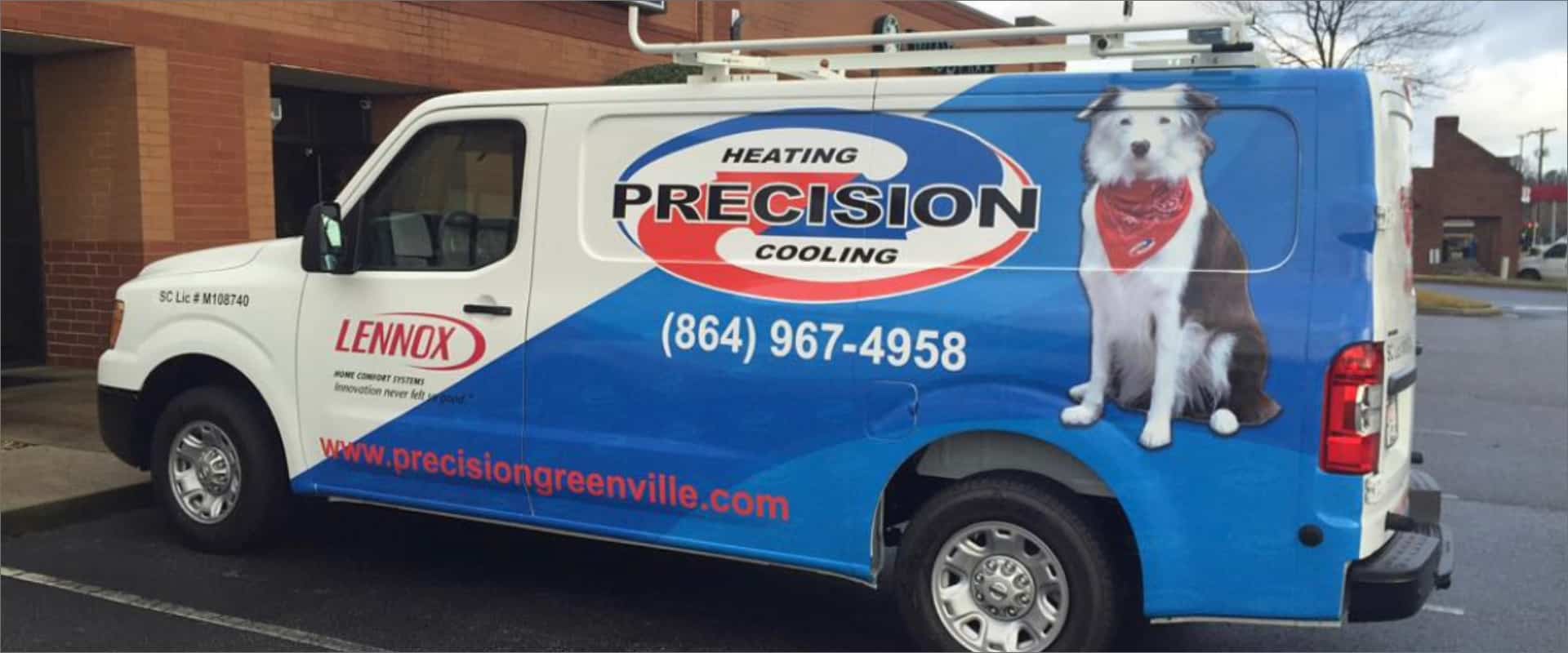 precision heating and cooling hvac van parked out front of office